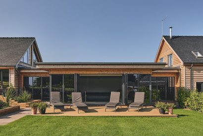 The sun loungers and garden at Big Barn, Welsh Borders