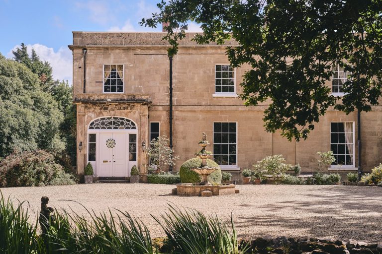 The Manor house with garden fountain in Somerset